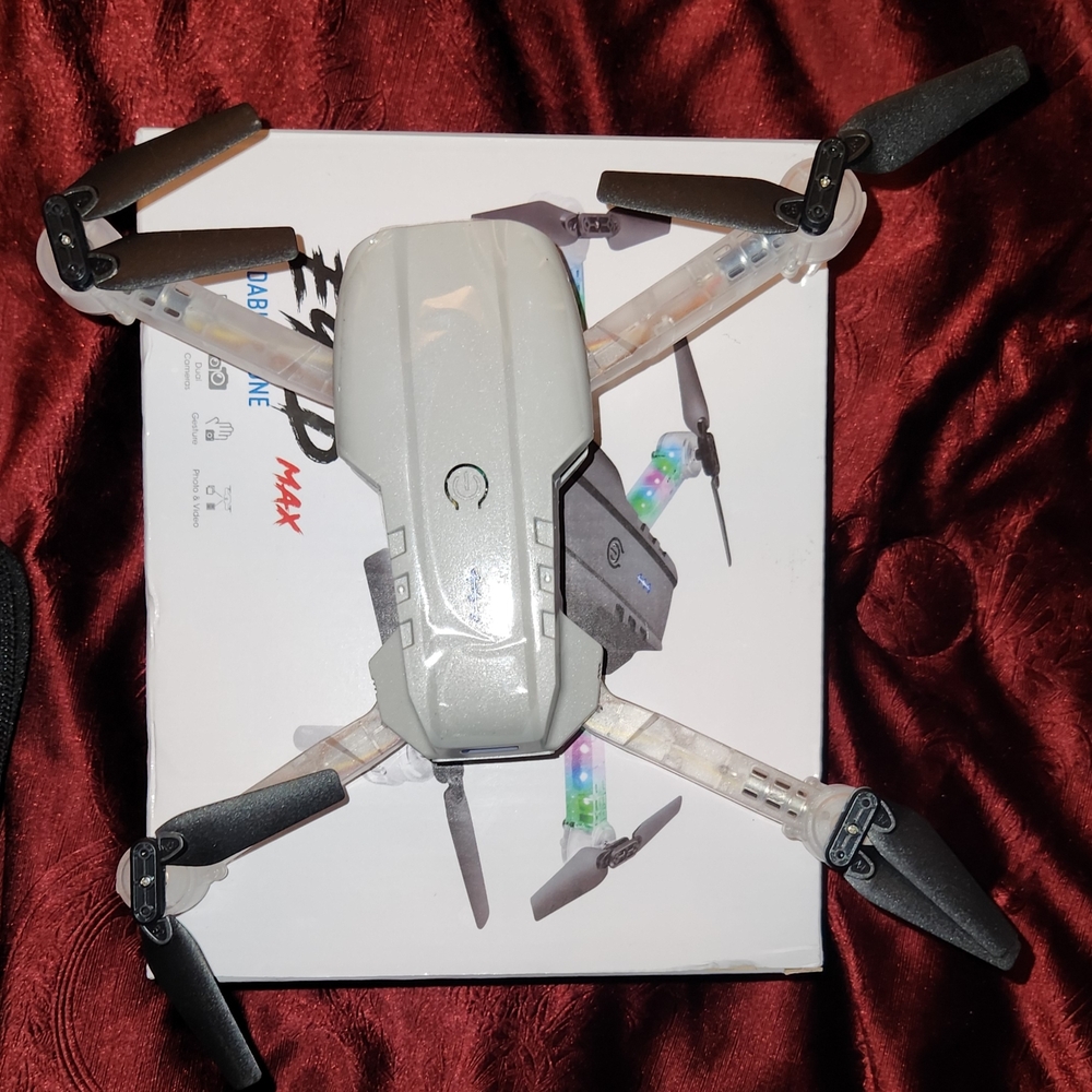 Silver Foldable Drone with Black Propellers